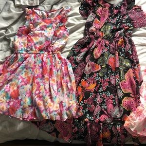 Three floral girl dresses